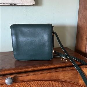 Wilson Green Leather Crossbody Bag with gold accents.